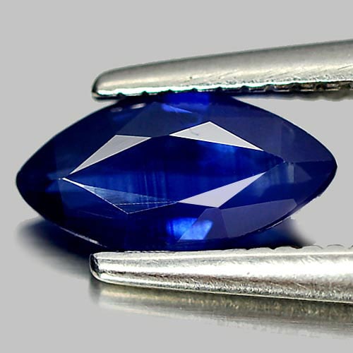 Natural Deep Blue Sapphire Gemstones 0.59 Ct. Marquise Shape 7.8 x 4 x 2.2 Mm.: Product ID: 806011361 Product Name: Natural Blue Sapphire Weight: 0.59 CT. Size: 7.8 x 4 x 2.2 MM. Shape: Marquise Color: Deep Blue Clarity:VSI Luster: Good Gems Origin: Thailand Treatment: Heated Cry