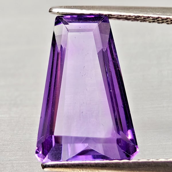 Natural Purple Amethyst Gemstones 5.50 Ct. Fancy Shape 14 x 9.6 Mm.: Product ID: 800325412 Product Name: Natural Amethyst Weight: 5.50 CT. Size: 14 x 9.6 x 6.2 MM. Shape: Fancy Shape Color: Purple Clarity:VSI Luster: Good Gems Origin: Brazil Treatment: Unheated Crystal