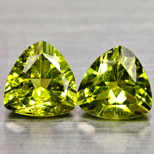 Natural Green Peridot Gemstones 1.78 Ct. 2 Pcs. Trilliant Shape 6.1 Mm.: Product ID: 805317035 Product Name: Natural Peridot Weight: 1.78 CT. Size: 6.1 x 6.1 x 3.9 MM. Shape: Trilliant Color: Green Clarity:VSI Luster: Good Gems Origin: Pakistan Treatment: Unheated Crystal 