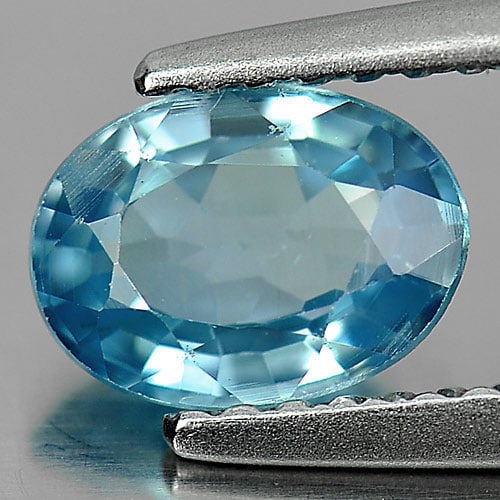 Natural Blue Zircon Gemstones 1.21 Ct. Oval Shape 7.1 x 5.2 Mm.: Product ID: 807728886 Product Name: Natural Zircon Weight: 1.21 CT. Size: 7.1 x 5.2 x 3.4 MM. Shape: Oval Color: Blue Clarity:VS Luster: Very Good Gems Origin: Cambodia Treatment: Heated Crystal Struc