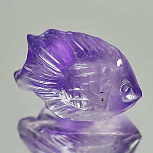 Natural Violet Amethyst Gemstone 5.87 Ct. Fish Carving Shape 14 x 11.3 Mm.: Product ID: 810301966 Product Name: Natural Amethyst Weight: 5.87 CT. Size: 14 x 11.3 x 7 MM. Shape: Fish Carving Color: Violet Clarity:Semi - Transparent Luster: Good Gems Origin: Brazil Treatment: U