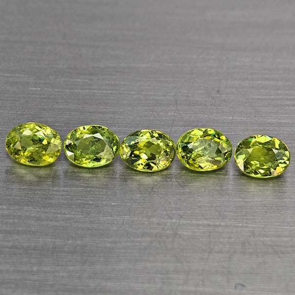 Natural Green Demantiod Garnet Gemstones 1.14 Ct. 5 Pcs. Oval Shape 4 x 3 Mm.: Product ID: 802937614 Product Name: Natural Demantoid Weight: 1.14 CT. Size: 4 x 3 x 2 MM. Shape: Oval Shape Color: Green Clarity:SI1 Luster: Good Gems Origin: Madagascar Treatment: Unheated Crystal S
