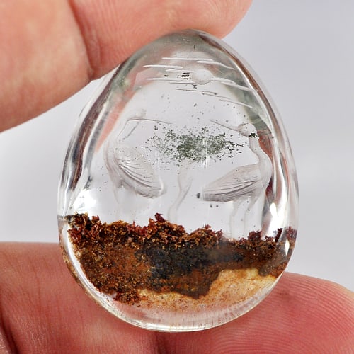 Natural Moss Quartz 100 Ct. Birds Carving Inner Pear Cabochon Shape 36 x 28 Mm. Gemstone from: Product ID: 805527055 Product Name: Natural Quartz Weight: 100.00 CT. Size: 36 x 28 x 15 MM. Shape: Pear Cabochon Color: White Clarity:Semi - Transparent Luster: Good Gems Origin: Thailand Treatment: 