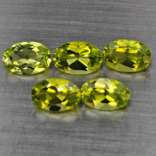 Natural Green Peridot Gemstones 2.76 Ct. 5 Pcs. Oval Shape 6.1 x 4.1 Mm.: Product ID: 805317722 Product Name: Natural Peridot Weight: 2.76 CT. Size: 6.1 x 4.1 x 3.4 MM. Shape: Oval Shape Color: Green Clarity:VVS-VSI Luster: Good Gems Origin: Pakistan Treatment: Unheated Cry