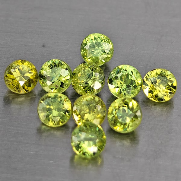 Natural Green Demantiod Garnet Gemstones 1.55 Ct. 10 Pcs. Round Diamond Cut 3.2 Mm.: Product ID: 802937704 Product Name: Natural Demantoid Weight: 1.55 CT. Size: 3.2 x 3.2 x 2.4 MM. Shape: Round Diamond Cut Color: Green Clarity:SI1 Luster: Good Gems Origin: Madagascar Treatment: Unhea