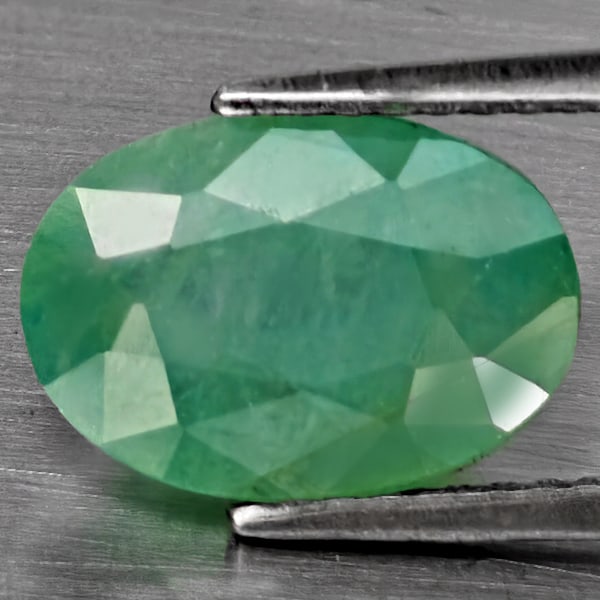 Natural Green Blueish Grandidierite Gemstones 3.46 Ct. Oval Shape 10.8 x 7.7 Mm.: Product ID: 803100056 Product Name: Natural Tsavorite Weight: 3.46 CT. Size: 10.8 x 7.7 x 5.7 MM. Shape: Oval Shape Color: Green Blueish Clarity:SI1 Luster: Good Gems Origin: Madagascar Treatment: Unh
