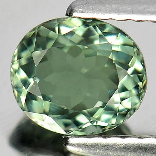 Natural Bluish Green Tourmaline Gemstones 0.96 Ct. Oval Shape 6.6 x 5.8 Mm.: Product ID: 807246375 Product Name: Natural Tourmaline Weight: 0.96 CT. Size: 6.6 x 5.8 x 3.7 MM. Shape: Oval Color: Bluish Green Clarity:VVS Luster: Good Gems Origin: Nigeria Treatment: Unheated Crys