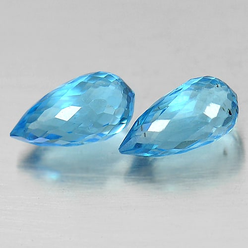 Natural Swiss Blue Topaz Gemstones 1.96 Ct. 2 Pcs Briolette Shape 7.9 x 4.5 Mm.: Product ID: 807151172 Product Name: Natural Blue Topaz Weight: 1.96 CT. Size: 7.9 x 4.5 x 4.5 MM. Shape: Briolette Color: Swiss Blue Clarity:VSI Luster: Good Gems Origin: Brazil Treatment: Treated Cry