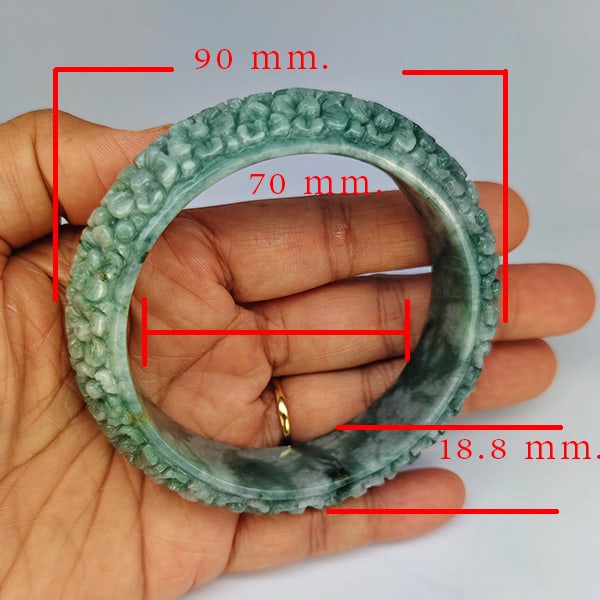Natural Green Jade Carving Bangle 459.49 Ct. Diameter 60 Mm.: Product ID: 819816081 Product Name: Natural Jade Weight: 459.49 CT. Size: 90 x 70 x 18.8 MM. Shape: Bangle Round Cabochon Color: Green Clarity:Semi-Transparent Luster: Good Gems Origin: Thailand Treat