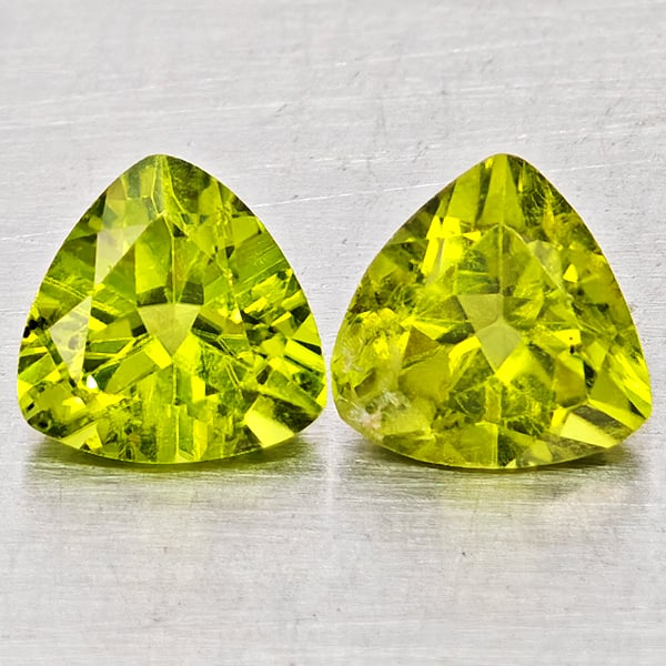 Natural Green Peridot Gemstones 1.72 Ct. 2 Pcs. Trilliant Shape 6 Mm.: Product ID: 805317541 Product Name: Natural Peridot Weight: 1.72 CT. Size: 6 x 6 x 4 MM. Shape: Trilliant Color: Green Clarity:SI1 Luster: Good Gems Origin: Pakistan Treatment: Unheated Crystal Struct