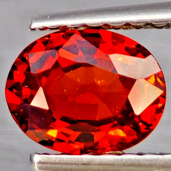 Natural Orangish Red Spessartine Garnet Gemstones 0.91 Ct. Oval Shape 6.5 x 5.1 Mm.: Product ID: 802937337 Product Name: Natural Garnet Weight: 0.91 CT. Size: 6.5 x 5.1 x 3 MM. Shape: Oval Shape Color: Orangish Red Clarity:SI1 Luster: Good Gems Origin: Namibia Treatment: Unheated Crys