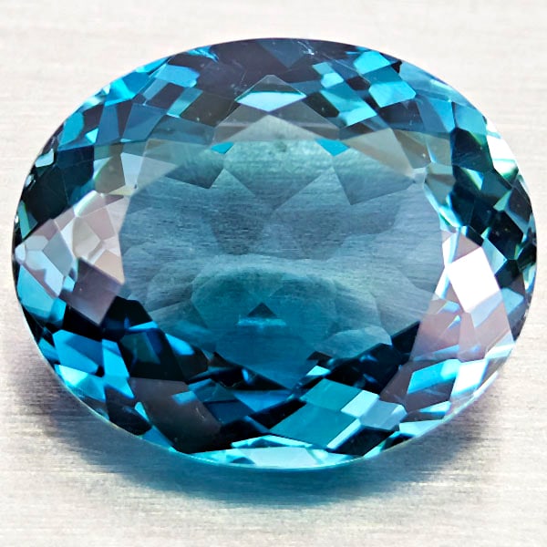 Natural London Blue Topaz Gemstones 4.45 Ct. Oval Shape 9.2 x 11.1 Mm: Product ID: 807168430 Product Name: Natural Blue Topaz Weight: 4.45 CT. Size: 9.2 x 11.1 x 5.3 MM. Shape: Oval Color: London Blue Clarity:VVS - VSI Luster: Very Good Gems Origin: Brazil Treatment: Tre