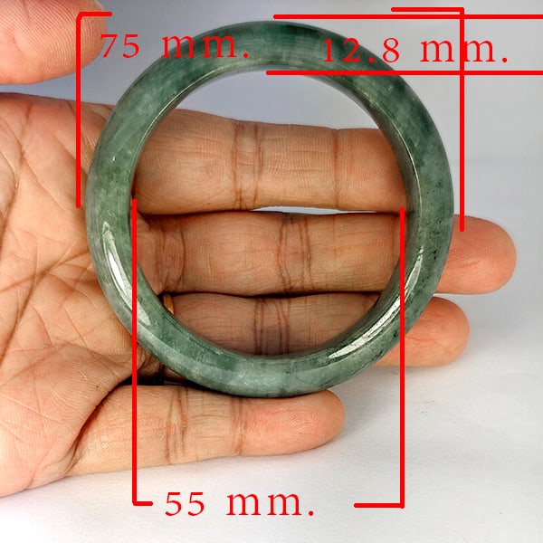 Natural Green Jade Bangle 307.21 Ct. Diameter 55 Mm.: Product ID: 819816046 Product Name: Natural Gemstones Weight: 307.21 CT. Size: 75 x 55 x 12.8 MM. Shape: Round Color: Multi-Color Clarity:Opaque Luster: Good Gems Origin: Thailand Treatment: Unheated 