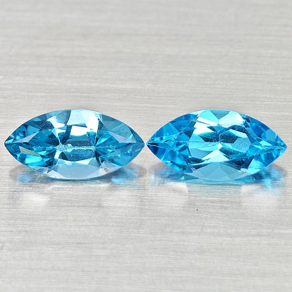 Natural Swiss Blue Topaz Gemstones 2.77 Ct. 2 Pcs. Marquise Shape 10.2 x 5.1 Mm.: Product ID: 807168191 Product Name: Natural Blue Topaz Weight: 2.77 CT. Size: 10.2 x 5.1 x 3.9 MM. Shape: Marquise Shape Color: Swiss Blue Clarity:VSI Luster: Good Gems Origin: Brazil Treatment: Treat