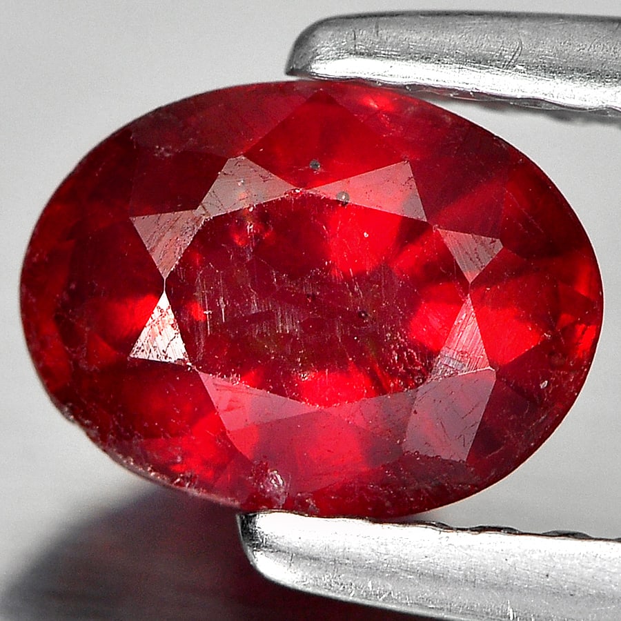 Natural Purplish Red Ruby Gemstones 1.15 Ct. Oval Shape 7 x 5.2 Mm.: Product ID: 805934886 Product Name: Natural Ruby Weight: 1.15 CT. Size: 7 x 5.2 x 3.6 MM. Shape: Oval Color: Red Clarity:SI1 Luster: Good Gems Origin: Madagascar Treatment: Heated (Lead glass fillin C