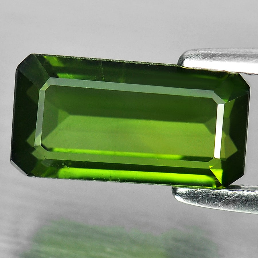 Natural Green Tourmaline Gemstones 2.66 Ct. Octagon Shape 11.3 x 6 Mm.: Product ID: 807237966 Product Name: Natural Tourmaline Weight: 2.66 CT. Size: 11.3 x 6 x 4.1 MM. Shape: Octagon Color: Green Clarity:VSI Luster: Good Gems Origin: Nigeria Treatment: Unheated Crystal S