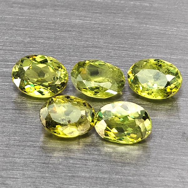 Natural Green Demantiod Garnet Gemstones 1.01 Ct. 5 Pcs. Oval Shape 4.2 x 3.2 Mm.: Product ID: 802937511 Product Name: Natural Demantoid Weight: 1.01 CT. Size: 4.2 x 3.2 x 2 MM. Shape: Oval Color: Green Clarity:SI1 Luster: Good Gems Origin: Madagascar Treatment: Unheated Crystal Str