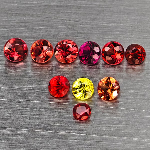 Natural Multi Color Songea Sapphire Gemstones 0.54 Ct. 10 Pcs. Round Diamond Cut 2 Mm.: Product ID: 806162823 Product Name: Natural Red Sapphire Weight: 0.54 CT. Size: 2 x 2 x 1.6 MM. Shape: Round Diamond Cut Color: Multi Color Clarity:VVS-VSI Luster: Very Good Gems Origin: Tanzania Trea