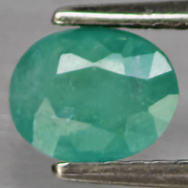 Natural Green Blueish Grandidierite Gemstones 1.00 Ct. Oval Shape 6.7 x 5.2 Mm.: Product ID: 803100078 Product Name: Natural Tsavorite Weight: 1.00 CT. Size: 6.7 x 5.2 x 4.1 MM. Shape: Oval Shape Color: Green Blueish Clarity:SI1 Luster: Good Gems Origin: Madagascar Treatment: Unhe