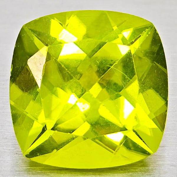 Natural Green Peridot Gemstones 1.52 Ct. Cushion Shape 7.1 Mm.: Product ID: 805317243 Product Name: Natural Peridot Weight: 1.52 CT. Size: 7.1 x 7.1 x 4.4 MM. Shape: Cushion Shape Color: Green Clarity:VSI - SI1 Luster: Good Gems Origin: Pakistan Treatment: Unheate