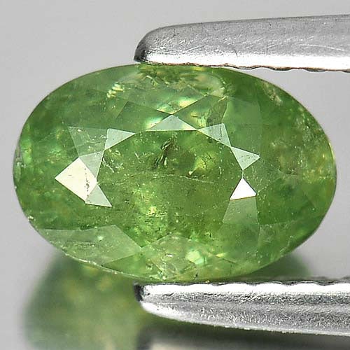 Natural Green Demantoid Garnet Gemstones 1.54 Ct. Oval Shape 7.7 x 5.3 Mm.: Product ID: 802919335 Product Name: Natural Demantoid Weight: 1.54 CT. Size: 7.7 x 5.3 x 4.6 MM. Shape: Oval Color: Green Clarity:SI Luster: Good Gems Origin: Madagascar , Africa Treatment: Unheated C