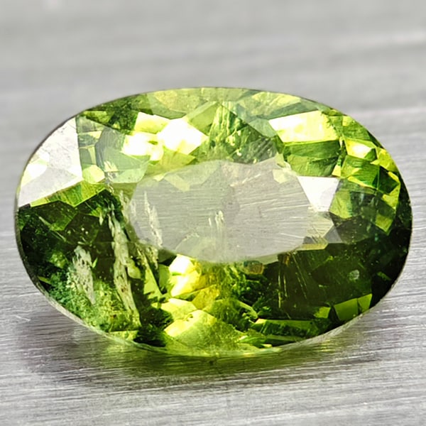 Natural Paraiba Color Green Apatite Gemstones 0.87 Ct. Oval Shape 7.3 x 5.2 Mm.: Product ID: 800613565 Product Name: Natural Apatite Weight: 0.87 CT. Size: 7.3 x 4.9 x 3.5 MM. Shape: Oval Color: Neon Green Clarity:VSI Luster: Very Good Gems Origin: Tanzania Treatment: Unheated Cry