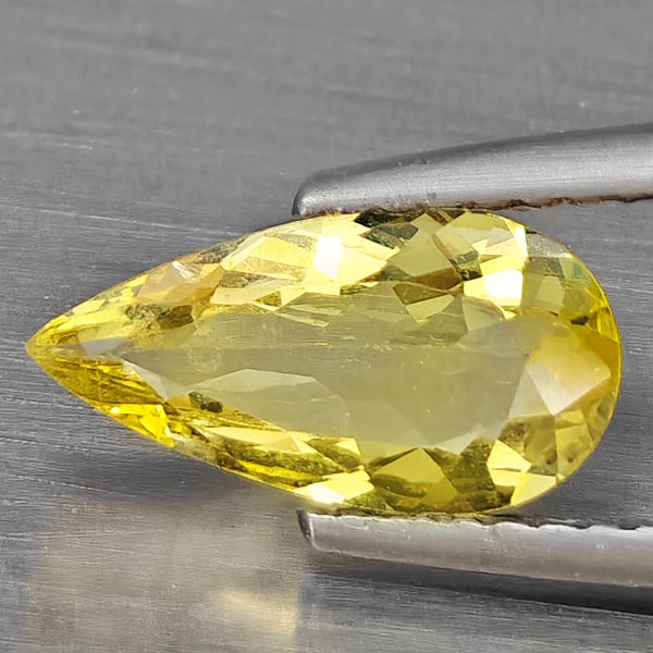 Natural Yellow Beryl Gemstones 0.90 Ct. Pear Shape 11 x 5.8 Mm.: Product ID: 801102740 Product Name: Natural Beryl Weight: 0.90 CT. Size: 11 x 5.8 x 5 MM. Shape: Pear Shape Color: Yellow Clarity:SI1 Luster: Good Gems Origin: Brazil Treatment: Unheated Crystal Struc