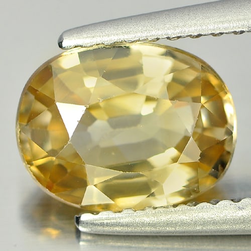 Natural Yellow Zircon Gemstones 2.39 Ct. Oval Shape 8.6 x 6.6 Mm.: Product ID: 807727832 Product Name: Natural Zircon Weight: 2.39 CT. Size: 8.6 x 6.6 x 4.8 MM. Shape: Oval Color: Yellow Clarity:VSI Luster: Good Gems Origin: Cambodia Treatment: Heated Crystal Structu