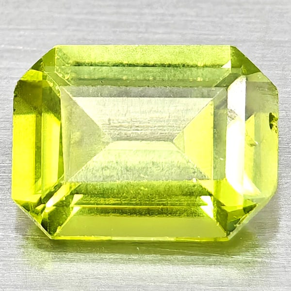 Natural Green Peridot Gemstones 1.21 Ct. Octagon Shape 7.8 x 5.8 Mm.: Product ID: 805317175 Product Name: Natural Peridot Weight: 1.21 CT. Size: 7.8 x 5.8 x 3.4 MM. Shape: Octagon Color: Green Clarity:VSI - SI1 Luster: Good Gems Origin: Pakistan Treatment: Unheated Crys