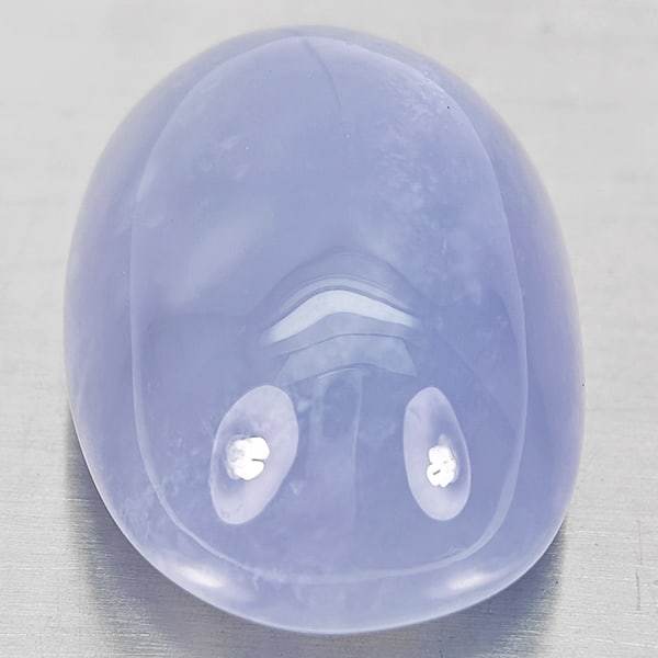 Natural Lavender Chalcedony Gemstones 43.22 Ct. Oval Cabochon Shape 26 x 18.4 Mm.: Product ID: 801502678 Product Name: Natural Chalcedony Weight: 43.22 CT. Size: 26 x 18.4 x 13.5 MM. Shape: Oval Cabochon Color: Lavender Clarity:Semi - Transparent Luster: Good Gems Origin: Russia Tre