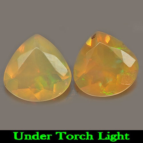 Natural Gems Multi Color Play Of Colour Opal Gemstones 1.66 Ct. 2 Pcs. Pear Shape: Product ID: 818725577 Product Name: Natural Opal Weight: 1.66 CT. Size: 8.1 x 8.1 x 4.2 MM. Shape: Pear Color: Multi Color Clarity:Semi - Transparent Luster: Iridescent Gems Origin: Ethiopia Treatment