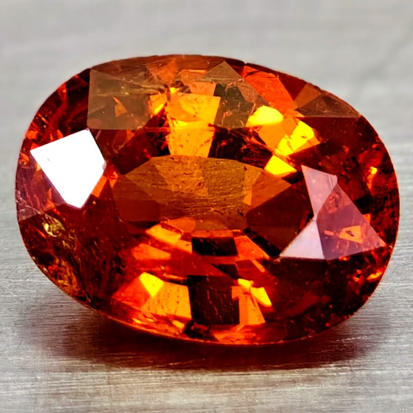 Natural Orange Spessartine Garnet Gemstones 1.91 Ct. Oval Shape 8.3 x 6.3 Mm.: Product ID: 802936594 Product Name: Natural Spessartine Weight: 1.91 CT. Size: 8.3 x 6.3 x 4.1 MM. Shape: Oval Color: Orange Clarity:VSI - SI1 Luster: Very Good Gems Origin: Namibia Treatment: Unheate