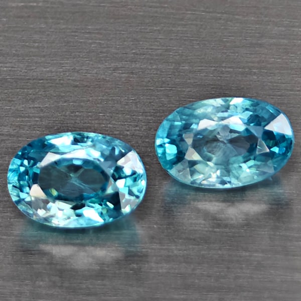 Natural Blue Zircon Gemstones 1.65 Ct. 2 Pcs. Oval Shape 6.3 x 4.3 Mm.: Product ID: 807725457 Product Name: Natural Zircon Weight: 1.65 CT. Size: 6.3 x 4.3 x 3.2 MM. Shape: Oval Shape Color: Blue Clarity:SI1 Luster: Good Gems Origin: Cambodia Treatment: Heated Crystal Str