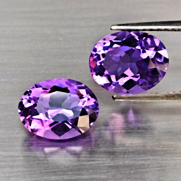 Natural Purple Amethyst Gemstones 4.54 Ct. 2 Pcs. Oval Shape 9.8 x 7.6 Mm.: Product ID: 800325662 Product Name: Natural Amethyst Weight: 4.54 CT. Size: 9.8 x 7.6 x 5.6 MM. Shape: Oval Shape Color: Purple Clarity:VVS Luster: Very Good Gems Origin: Brazil Treatment: Unheated Cr