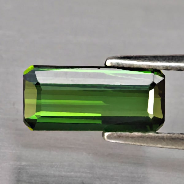 Natural Green Tourmaline Gemstones 1.05 Ct. Octagon Shape 9.1 x 4.2 Mm.: Product ID: 807250234 Product Name: Natural Tourmaline Weight: 1.05 CT. Size: 9.1 x 4.2 x 2.7 MM. Shape: Octagon Color: Green Clarity:VSI Luster: Good Gems Origin: Nigeria Treatment: Unheated Crystal 