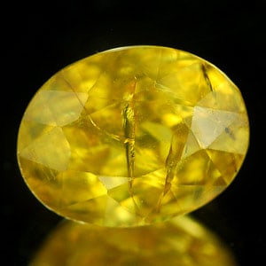 Natural Multi Color Titanium Sphene Red Spark 1.19 Ct. Oval Shape 6.9 x 5.4 Mm.: Product ID: 806503588 Product Name: Natural Sphene Weight: 1.19 CT. Size: 6.9 x 5.4 x 4.2 MM. Shape: Oval Color: Multi Color With Red Spark Clarity:SI Luster: Adamantine Gems Origin: Mardagascar Treat