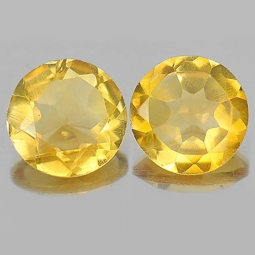 Natural Yellow Citrine Gemstones 1.80 Ct. 2 Pcs. Round Shape 7 Mm.: Product ID: 801811603 Product Name: Natural Citrine Weight: 1.80 CT. Size: 7 x 7 x 3.4 MM. Shape: Round Color: Yellow Clarity:VSI Luster: Good Gems Origin: Brazil Treatment: Unheated Crystal Structure