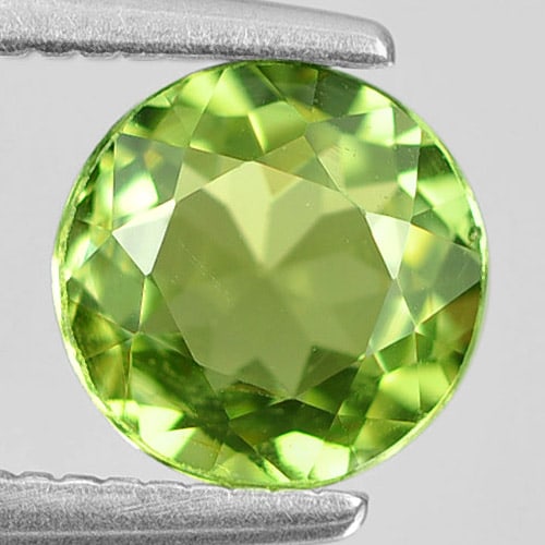 Natural Green Tourmaline Gemstones 0.81 Ct. Round Shape 6 Mm.: Product ID: 807246333 Product Name: Natural Tourmaline Weight: 0.81 CT. Size: 6 x 6 x 3.4 MM. Shape: Round Color: Green Clarity:VSI Luster: Good Gems Origin: Nigeria Treatment: Unheated Crystal Struct