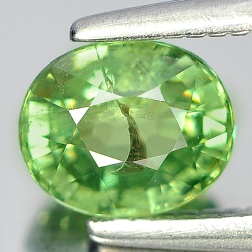 Natural Green Demantoid Garnet Gemstones 0.85 Ct. Oval Shape 6 x 4.8 Mm.: Product ID: 802912894 Product Name: Natural Demantoid Weight: 0.85 CT. Size: 6 x 4.8 x 3.2 MM. Shape: Oval Color: Green Clarity:SI Luster: Good Gems Origin: Madagascar , Africa Treatment: Unheated Cry