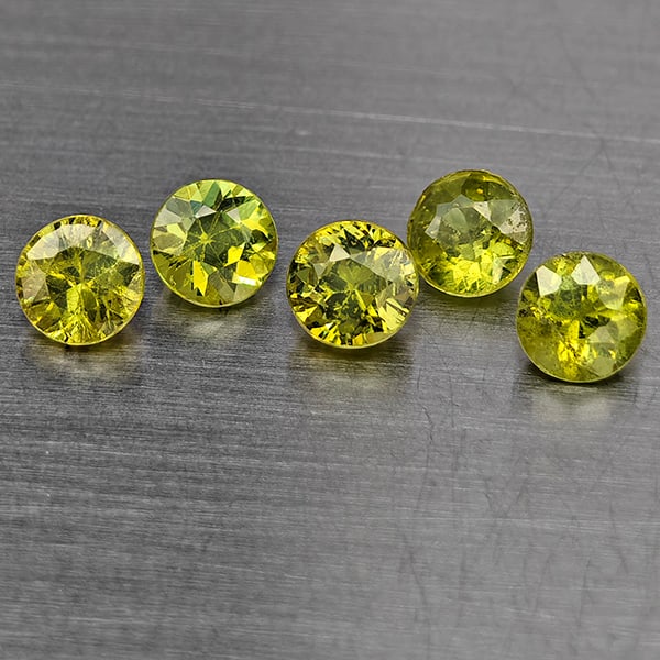 Natural Green Demantiod Garnet Gemstones 0.90 Ct. 5 Pcs. Round Diamond Cut 3.5 Mm.: Product ID: 802937637 Product Name: Natural Demantoid Weight: 0.90 CT. Size: 3.5 x 3.5 x 2.4 MM. Shape: Round Diamond Cut Color: Green Clarity:SI1 Luster: Good Gems Origin: Madagascar Treatment: Unhea