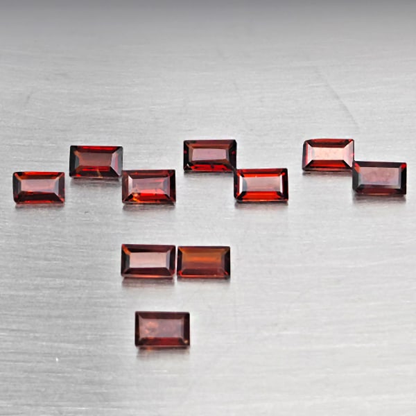Natural Orangish Red Garnet Gemstones 3.38 Ct. 10 Pcs. Baguette Shape 5.2 x 3.2 Mm.: Product ID: 802937886 Product Name: Natural Red Garnet Weight: 3.38 CT. Size: 5.2 x 3.2 x 1.9 MM. Shape: Baguette Shape Color: Orangish Red Clarity:SI1 Luster: Good Gems Origin: Tanzania Treatment: Un