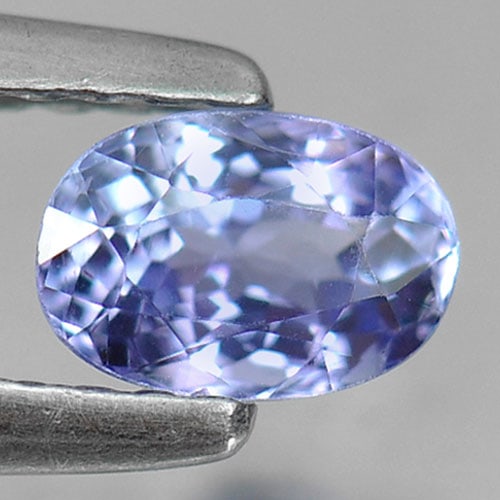 Natural Blue Tanzanite Gemstones 0.61 Ct. Oval Shape 5.7 x 3.9 Mm.: Product ID: 807007462 Product Name: Natural Tanzanite Weight: 0.61 CT. Size: 5.7 x 3.9 x 3.3 MM. Shape: Oval Color: Violetish Blue Clarity:VSI Luster: Good Gems Origin: Tanzania Treatment: Heated Crys