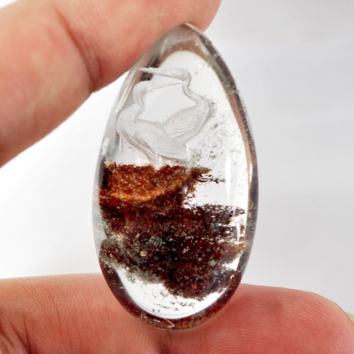 Natural Moss Quartz Gemstones 75.00 Ct. Birds Carving Inner Pear Cabochon Shape 42 x 22 Mm.: Product ID: 805527072 Product Name: Natural Quartz Weight: 75.00 CT. Size: 42 x 22 x 14 MM. Shape: Pear Cabochon Color: White Clarity:Semi - Transparent Luster: Good Gems Origin: Thailand Treatment: U