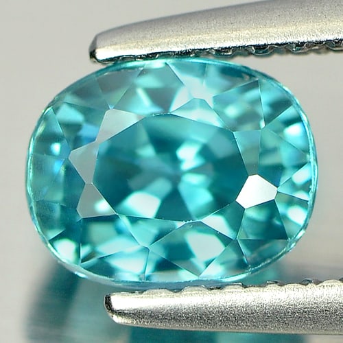 Natural Blue Zircon Gemstones 1.64 Ct. Oval Shape 6.5 x 5.2 Mm.: Product ID: 807727051 Product Name: Natural Zircon Weight: 1.64 CT. Size: 6.5 x 5.2 x 4.6 MM. Shape: Oval Color: Blue Clarity:VSI Luster: Good Gems Origin: Cambodia Treatment: Heated Crystal Structure