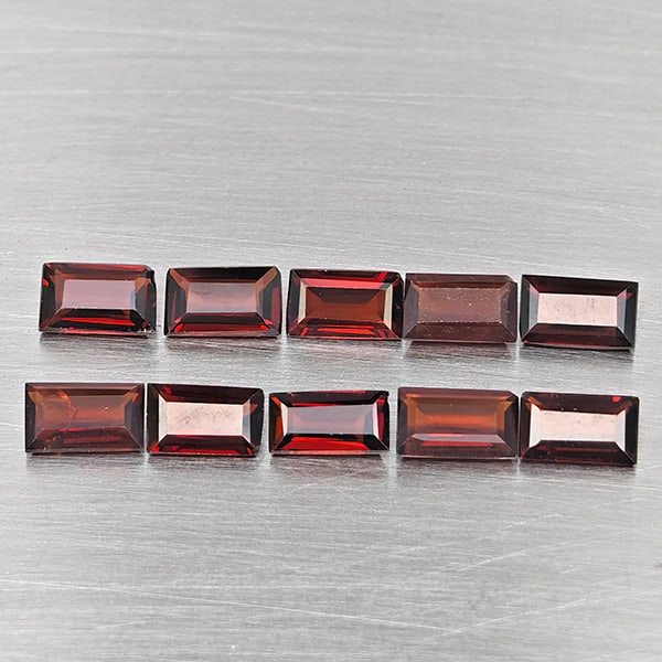 Natural Orangish Red Garnet Gemstones 2.90 Ct. 10 Pcs. Baguette Shape 5.2 x 3.2 Mm.: Product ID: 802937879 Product Name: Natural Red Garnet Weight: 2.09 CT. Size: 5.2 x 3.2 x 2.2 MM. Shape: Baguette Shape Color: Orangish Red Clarity:SI1 Luster: Good Gems Origin: Tanzania Treatment: Un