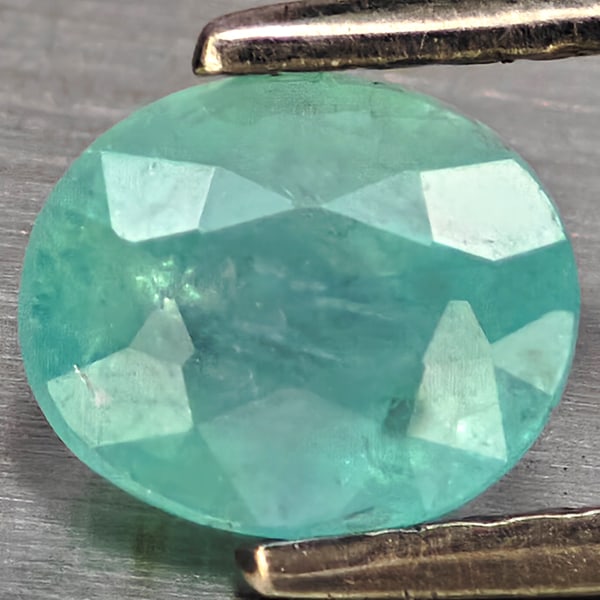 Natural Green Blueish Grandidierite Gemstones 1.14 Ct. Oval Shape 6.2 x 5.2 Mm.: Product ID: 803100090 Product Name: Natural Tsavorite Weight: 1.14 CT. Size: 6.2 x 5.2 x 4 MM. Shape: Oval Shape Color: Green Blueish Clarity:SI1 Luster: Good Gems Origin: Madagascar Treatment: Unheat