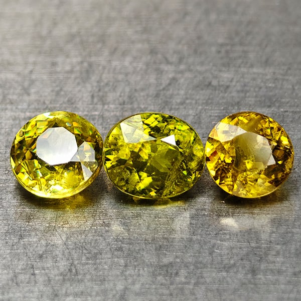 Natural Sphene Intense Green Titanium Red Spark 1.66 Ct. 3 Pcs. Mixed Shape: Product ID: 806509010 Product Name: Natural Sphene Weight: 1.66 CT. Size: 5.2 x 4.4 x 3.5 to 4.5 x 4.5 x 3 MM. Shape: Mixed Shape Color: Intense Yellow Green With Red Spark Clarity:SI Luster: Good Gem