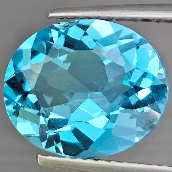 Natural Gem Swiss Blue Topaz Gemstones 5.17 Ct. Oval Shape 11.8 x 10.1 Mm. (1 of 3)