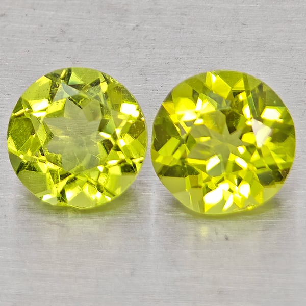 Natural Green Peridot Gemstones 1.60 Ct. 2 Pcs. Round Shape 5.9 Mm.: Product ID: 805317503 Product Name: Natural Rhodolite Weight: 1.60 CT. Size: 5.9 x 5.9 x 3.5 MM. Shape: Round Color: Green Clarity:VSI Luster: Good Gems Origin: Pakistan Treatment: Unheated Crystal St