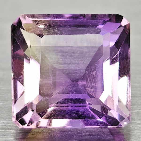 Natural Yellow & Purple Ametrine Gemstones 1.75 Ct. Octagon Shape 7.2 X 7.2 Mm.: Product ID: 100401934 Product Name: Natural Ametrine Weight: 1.75 CT. Size: 7.2 X 7.2 X 4.7 MM. Shape: Octagon Color: Yellow & Purple Clarity:IF Luster: Good Gems Origin: Brazil Treatment: Unheated Cr